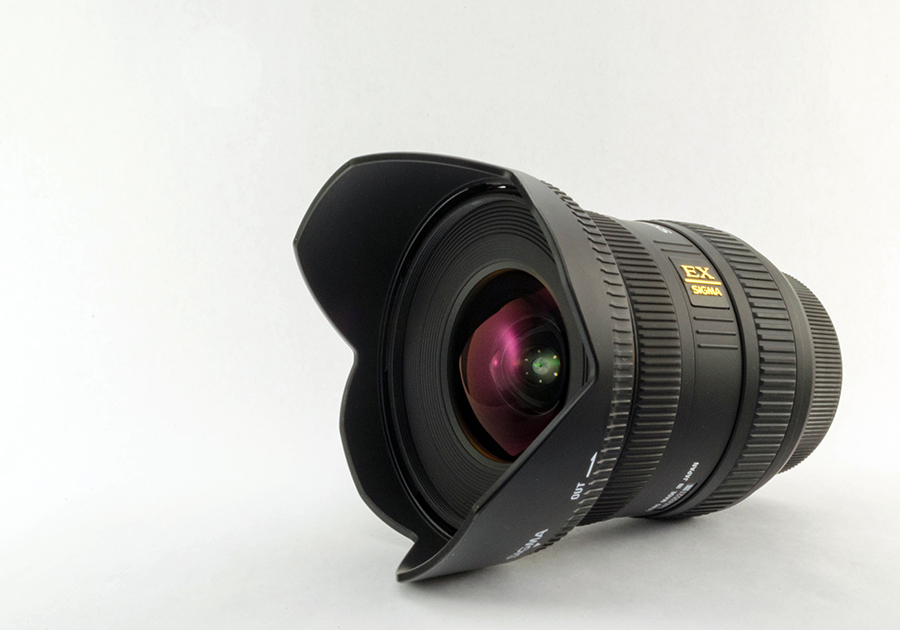 Product Style Photograph of a Sigma 10-20mm ultra wide angle lens.