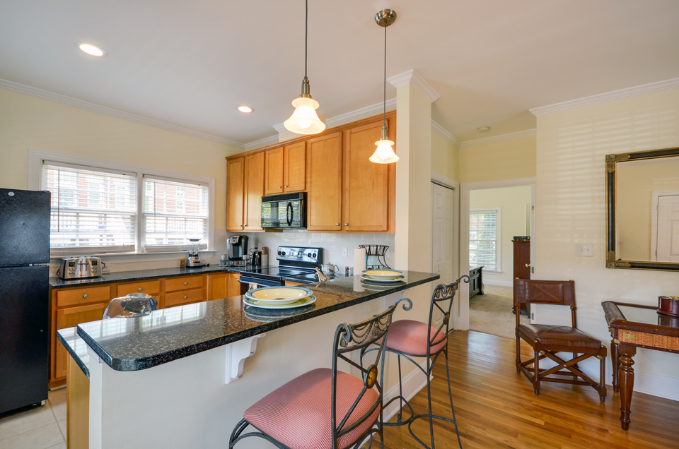 Breakfast bar and card table in a rental Condo, Greensboro NC. Real estate photo by Esjay Media.